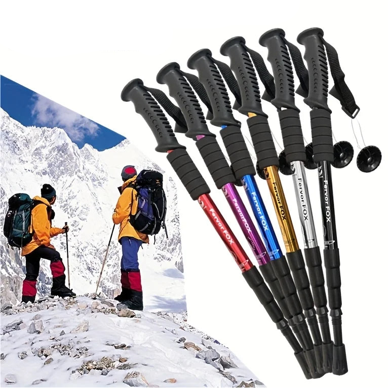 Set of hiking poles with a snowy mountain background - offered by the best outdoor gear store in America, The Adirondack Tool Co.