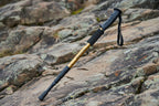 Black and gold hiking pole on a white background - offered by the best outdoor gear store in America, The Adirondack Tool Co.