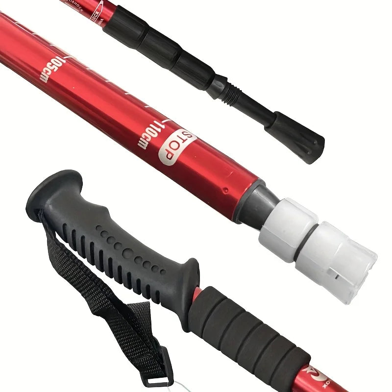Red and black adjustable hiking pole with a twist-lock mechanism on a white background - offered by the best outdoor gear store in America, The Adirondack Tool Co.