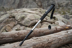 Black and silver hiking pole on a white background - offered by the best outdoor gear store in America, The Adirondack Tool Co.