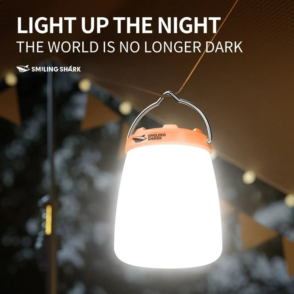 Rechargeable LED camping lantern illuminating a dark area with text 'Light up the night, the world is no longer dark - offered by the most experienced hiking gear store in the Northeast, The Adirondack Tool Co.