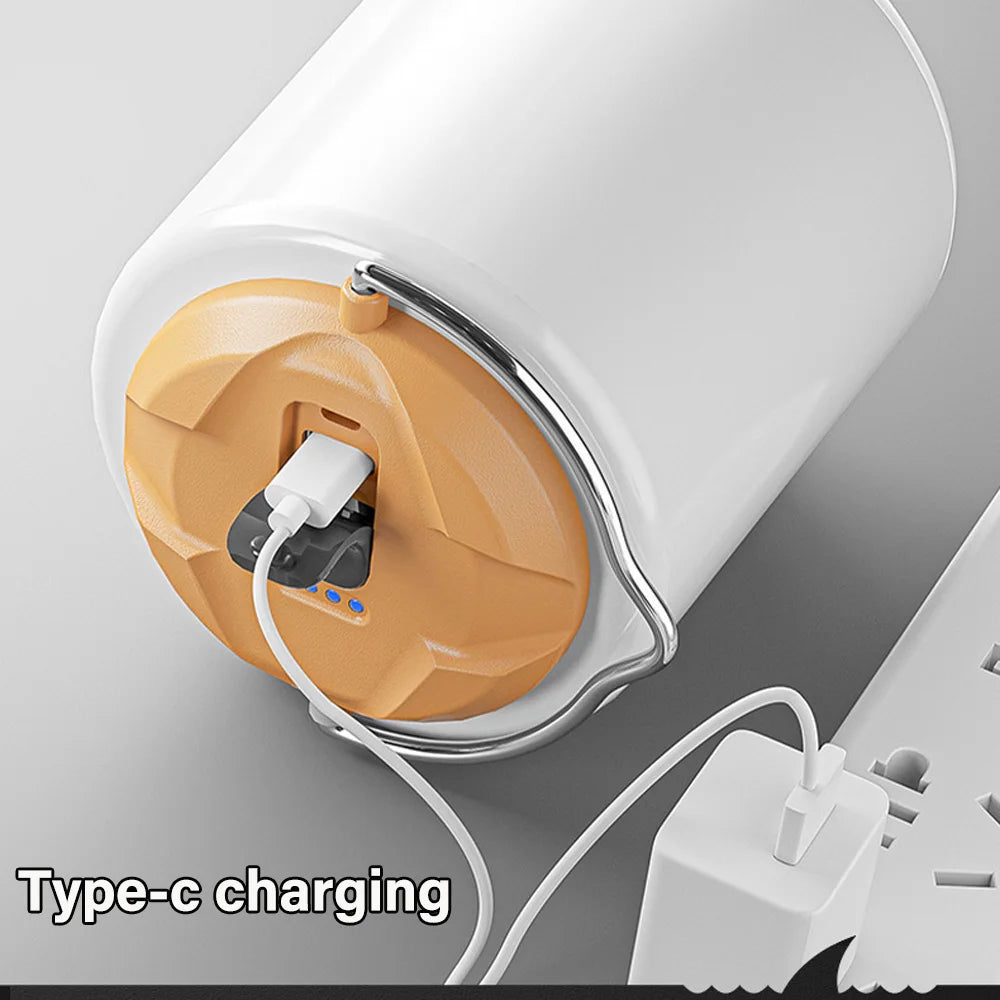 Close-up of a rechargeable LED Camping lantern with a Type-C charging cable plugged in on a gray background  - offered by the most experienced hiking gear store in the Northeast, The Adirondack Tool Co.