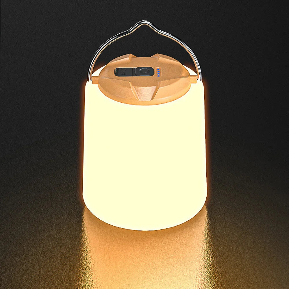 Portable rechargeable LED camping lantern with a USB cable on a dark background - offered by the most experienced hiking gear store in the Northeast, The Adirondack Tool Co.