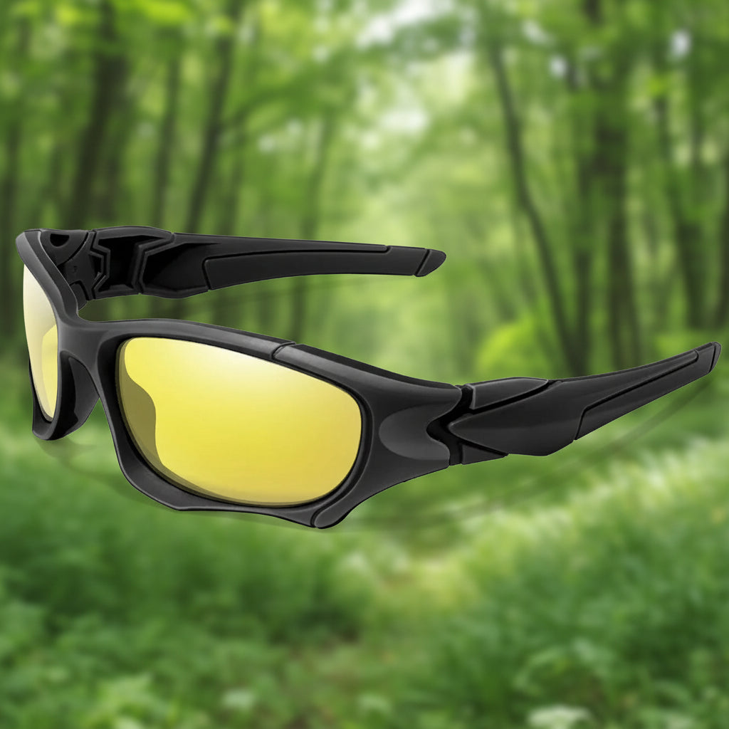 Black sunglasses with yellow lenses from Lois Ruby in an outdoor setting - offered by the best outdoor gear store on the east coast of the United States, The Adirondack Tool Co.