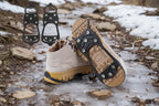 Hiking microspikes with boots on an icy trail - offered by quite possibly the greatest climbing and camping gear store in the entire world, The Adirondack Tool Co.