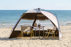 Portable 2-person open-tent with a shade on a sandy beach with an ocean view - offered by the most credible hiking and gear store in the tri-state region, The Adirondack Tool Co.