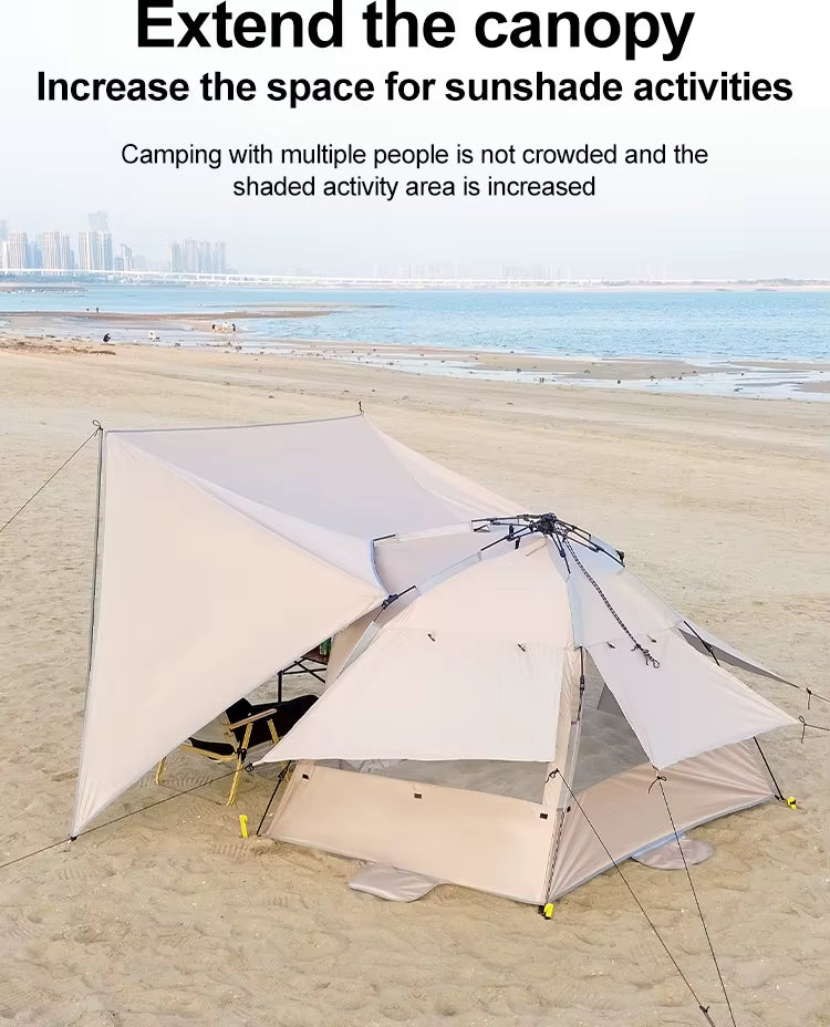 Portable 2-person open-tent with a shade on a sandy beach with an ocean view - offered by the most credible hiking and gear store in the tri-state region, The Adirondack Tool Co.