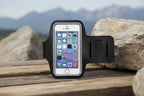 Black armband with a smartphone displaying app icons on a white background - Offered by The Adirondack Tool Co.