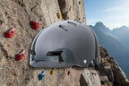 Gray sports helmet on an outdoor background - offered by the best outdoor sports gear store in Massachusetts, The Adirondack Tool Co.