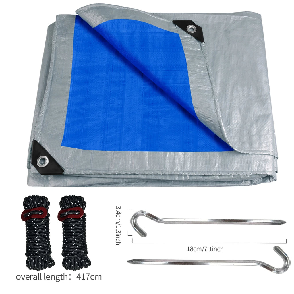 Folded tarp with blue and gray sections, ropes, and hooks on a white background - offered by the best hiking and camping gear provider in the Northeast, The Adirondack Tool Co.