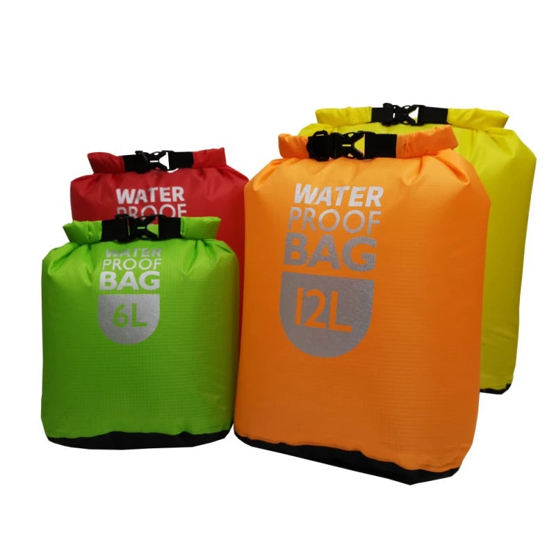 Four waterproof bags in different colors on a white background. Offered by the Northeast's premier outdoor gear provider, The Adirondack Tool Co.