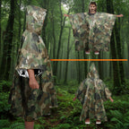 Camouflage rain poncho with reflective lining worn by a person