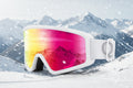 White ski goggles with colorful lens