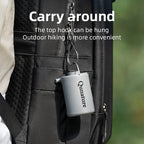 Qunature mini air pump attached to a backpack with text about convenience for outdoor activities - offered by the best camping gear store in New York, The ADK Tool Co.
