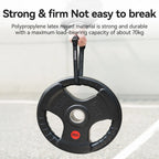 Qunature multi-purpose binding strap attached to a weight plate with text about strength and durability on a light background - offered by the best outdoor gear store in New York, The Adirondack Tool Co.