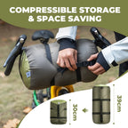 Person compressing a green compressible storage bag with a bicycle in the background, emphasizing space-saving feature.