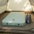 camping mattress on a tent floor shown as both fully deployed and fully packed - offered by the best outdoor gear store in New York, The Adirondack Tool Co.