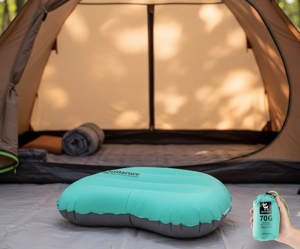 Turquoise inflatable pillow with Qunature branding and a packed away version displayed next to it - offered by the best camping gear store in New York, The ADK Tool Co.