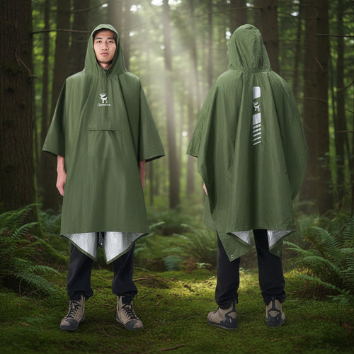 Green rain poncho worn by a man with Qunature branding on a forest background - offered by the best survival gear store in New York, The Adirondack Tool Co.