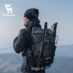 Person wearing a black backpack with a scenic background, featuring the Qunature brand logo.