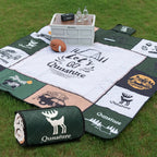 Qunature camping blanket on a grassy ground. Showed rolled and unrolled - offered by the best camping gear store in NY, The ADK Tool Co.