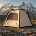 beige hexagonal camping tent from Qunature on a mountain background - offered by the best outdoor gear store in New York, The Adirondack Tool Co.