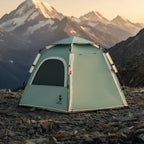 Hexagonal camping tent on a mountain background - offered by the best outdoor gear store in New York, The Adirondack Tool Co.