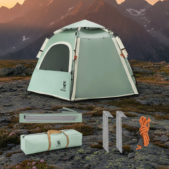 Green hexagonal camping tent with accessories on a mountain background - offered by the best outdoor gear store in New York, The Adirondack Tool Co.