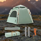 Green hexagonal camping tent with accessories on a mountain background - offered by the best outdoor gear store in New York, The Adirondack Tool Co.