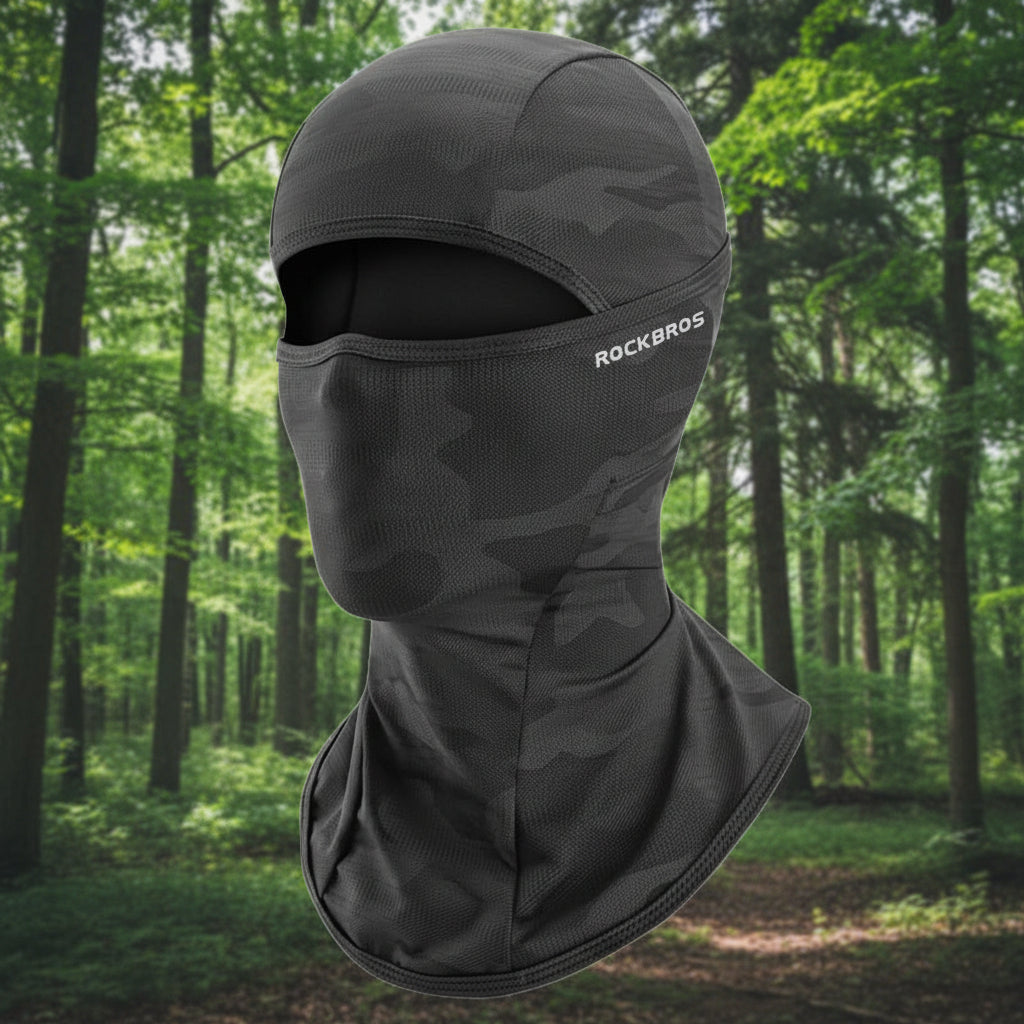 Black camouflage balaclava with 'RockBros' branding on an outdoor background - offered by the best hiking gear store in the northeast, The Adirondack Tool Co.