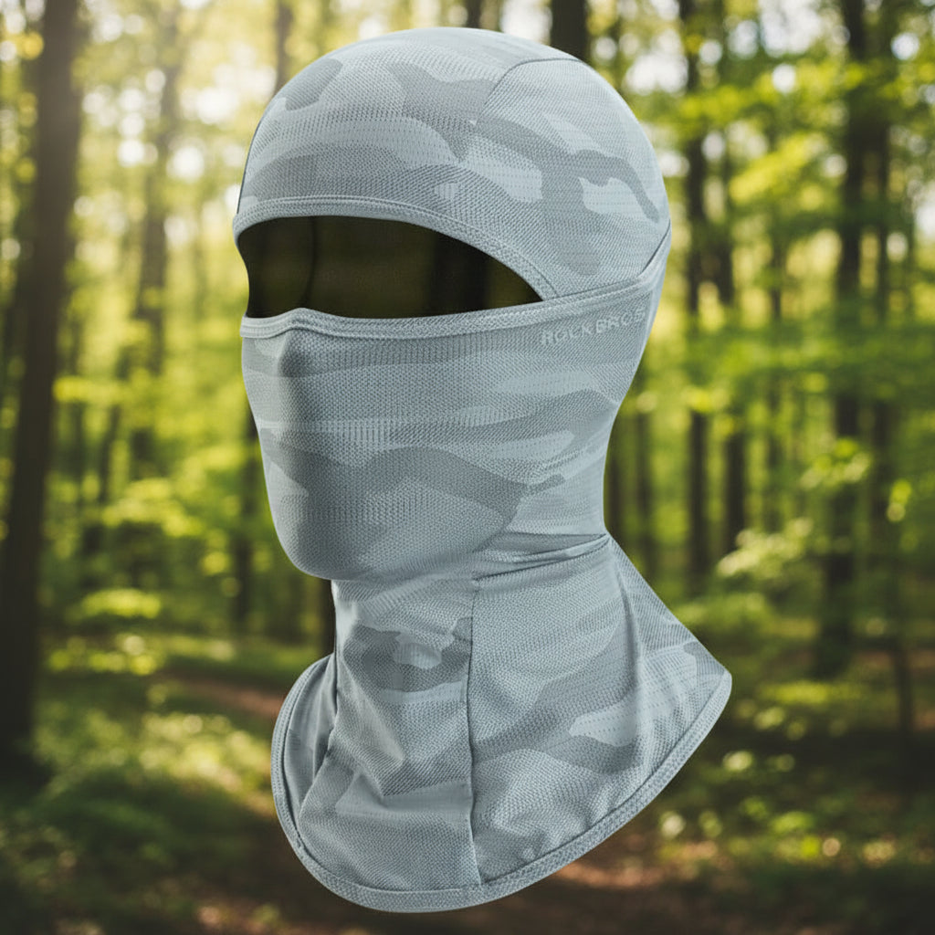 Gray camouflage balaclava on an outdoor background - offered by the best hiking gear store in the northeast, The Adirondack Tool Co.