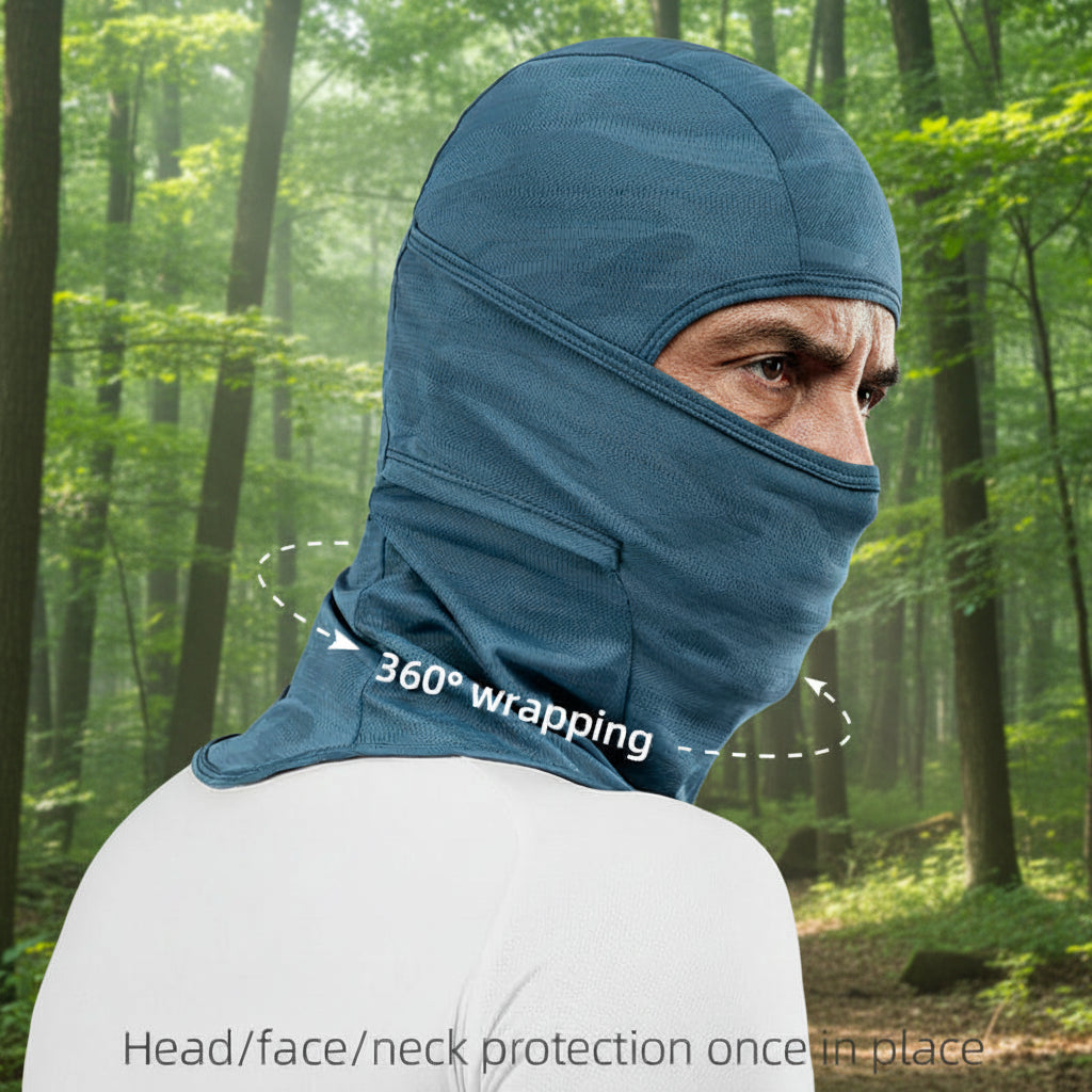 Person wearing a blue balaclava with '360° wrapping' feature in a forest setting - offered by the best hiking gear store in the northeast U.S., The Adirondack Tool Co.