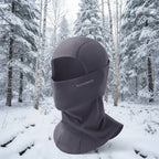 Gray balaclava with 'RockBros' branding on a snowy background - offered by the best outdoor gear store in New York, The Adirondack Tool Co.