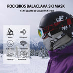 Person wearing a Rockbros balaclava ski mask with winter scenery in the background - offered by the best outdoor gear store in New York, The Adirondack Tool Co.
