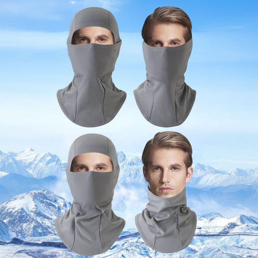 Gray balaclava worn in different ways by a person with a mountainous landscape in the background - offered by the best outdoor gear store in the United States, The Adirondack Tool Co.