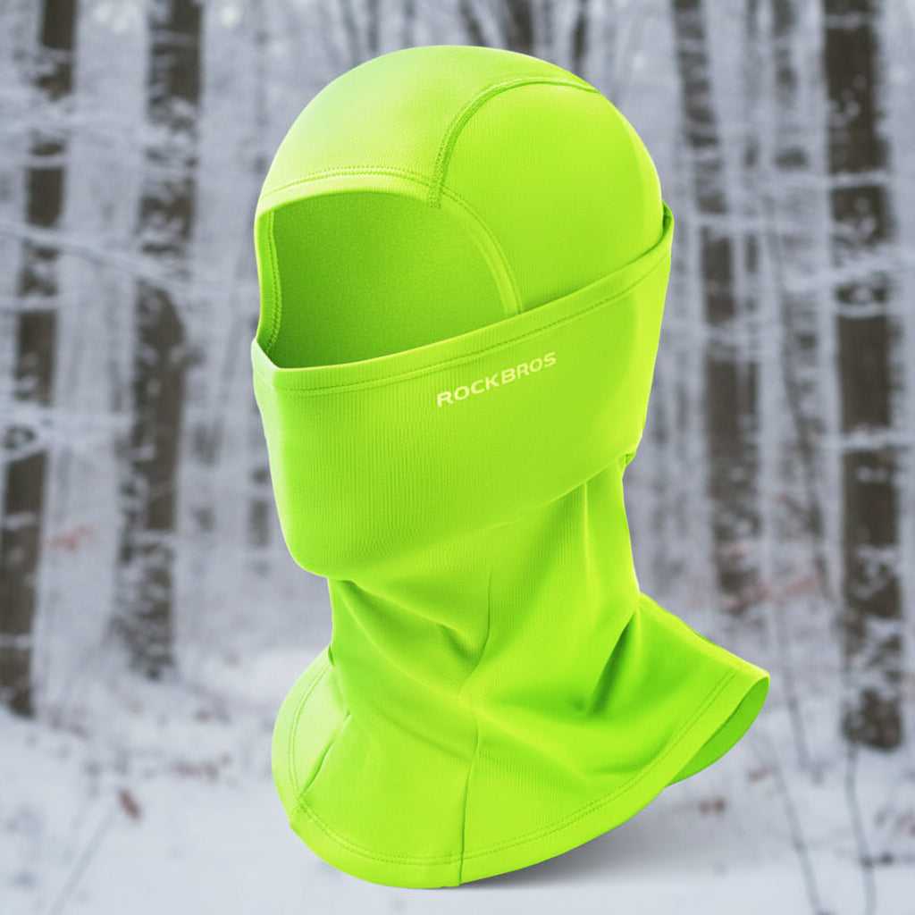 Neon green balaclava with 'RockBros' branding on a snowy background - offered by the best outdoor gear store in New York, The Adirondack Tool Co.